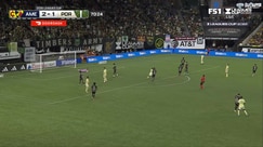 Luis Malagón makes a diving save to deny Felipe Mora