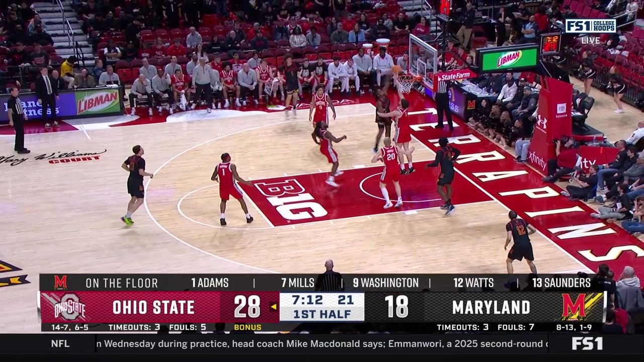 Andre Mills throws down a two-handed dunk