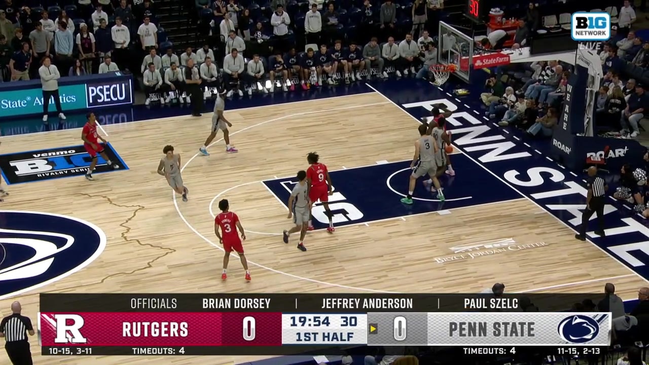 Emmanuel Ogbole dunks to open the scoring for Rutgers