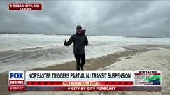 Reporter navigates sea foam and massive swells from Nor'easter in Ocean City, MD