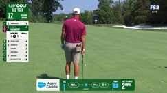 Lucas Herbert and caddie coordinate a high-quality approach shot