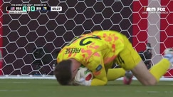 Demirovic's Powerful Shot is Saved by Matt Freeze