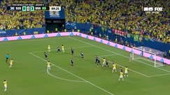 Brazil's powerful shot is denied by Scotland's goalkeeper