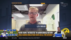Aaron Donald tempted by Rams' new roster, hints Les Snead