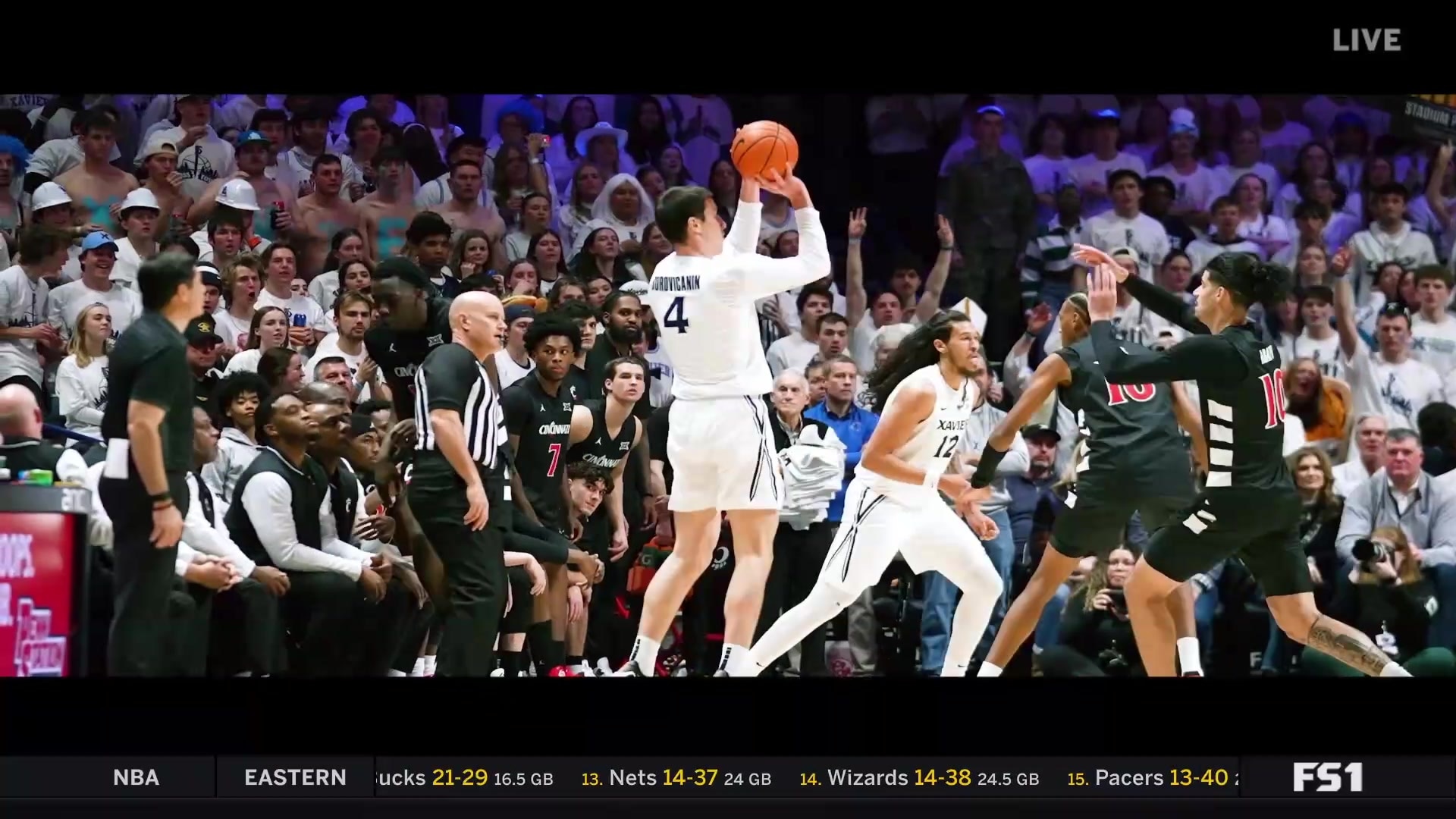 Rick Pitino celebrates 900th career win against son Richard Pitino