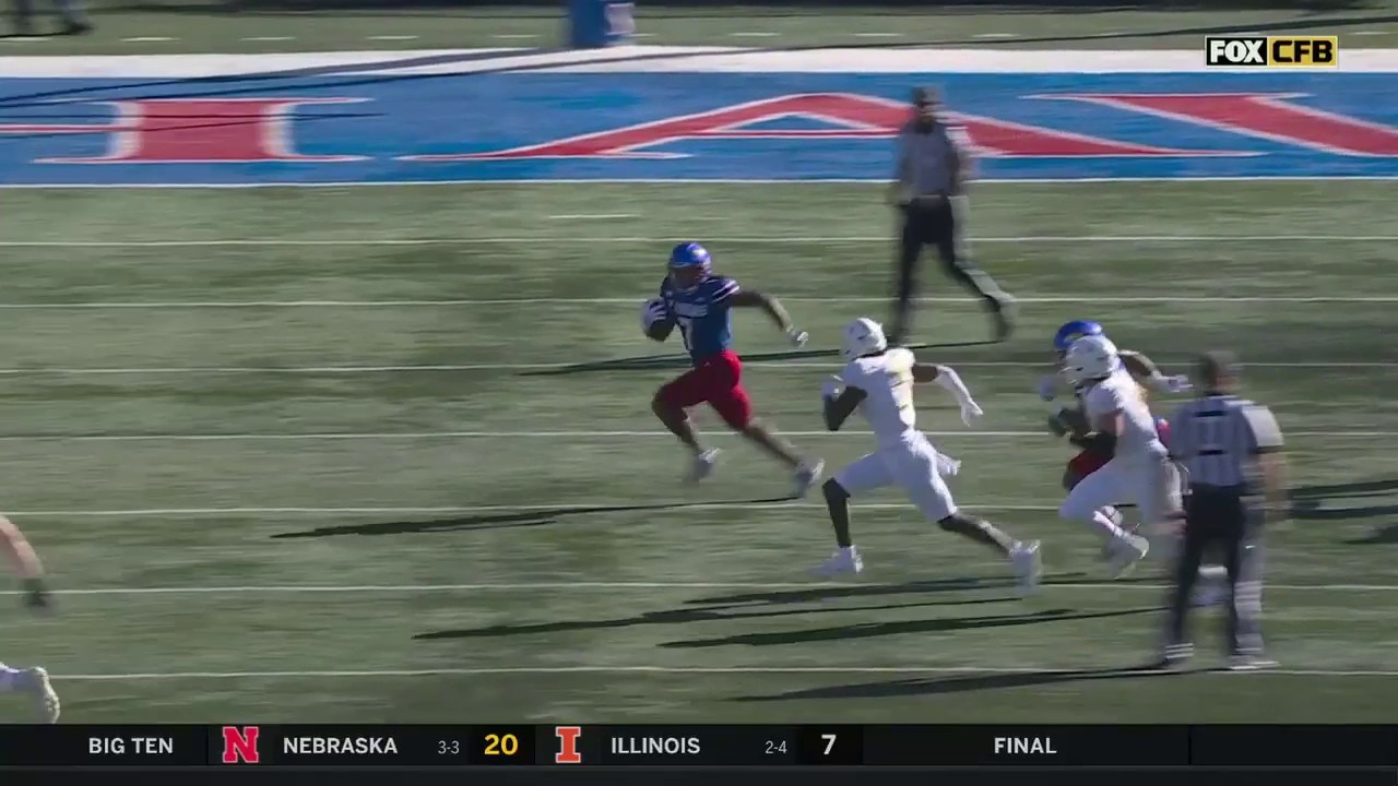 Trevor Wilson's UNREAL 82-yard punt return for a TD helps extend Kansas' lead against UCF