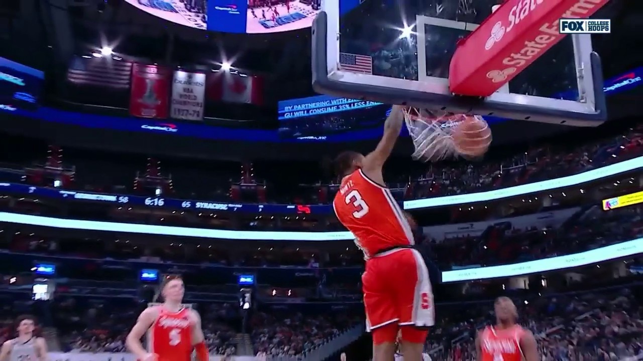 Syracuse’s Judah Mintz makes the steal and delivers a wicked one-handed jam against Georgetown