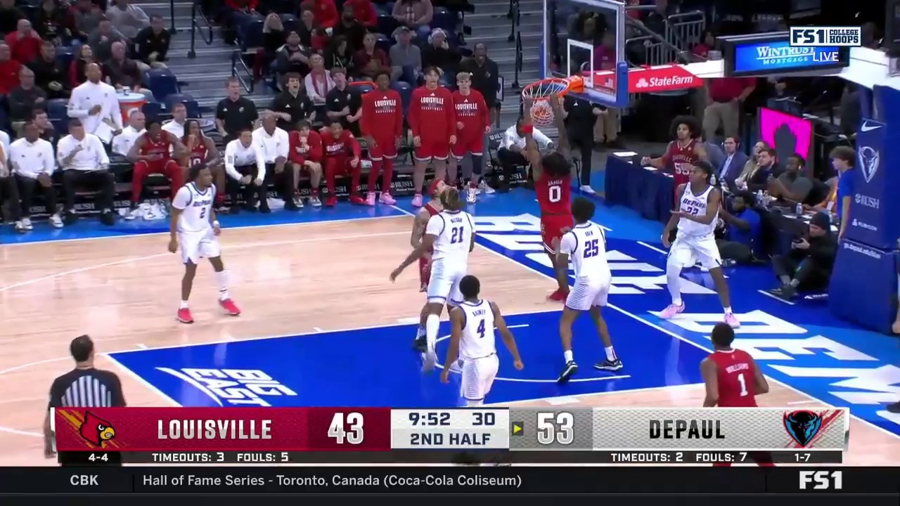 Louisville's Mike James flies in for the putback slam to trim DePaul's lead