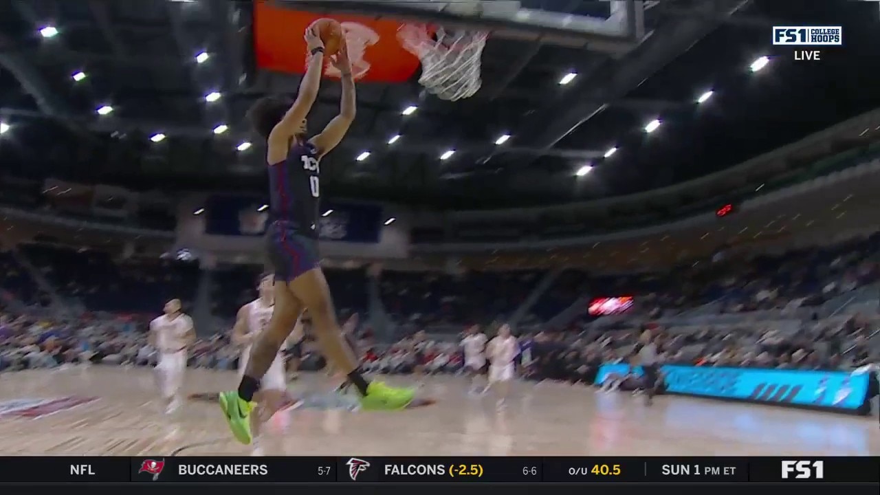 TCU's Micah Peavy intercepts Clemson's pass then slams it in transition to cut down the lead