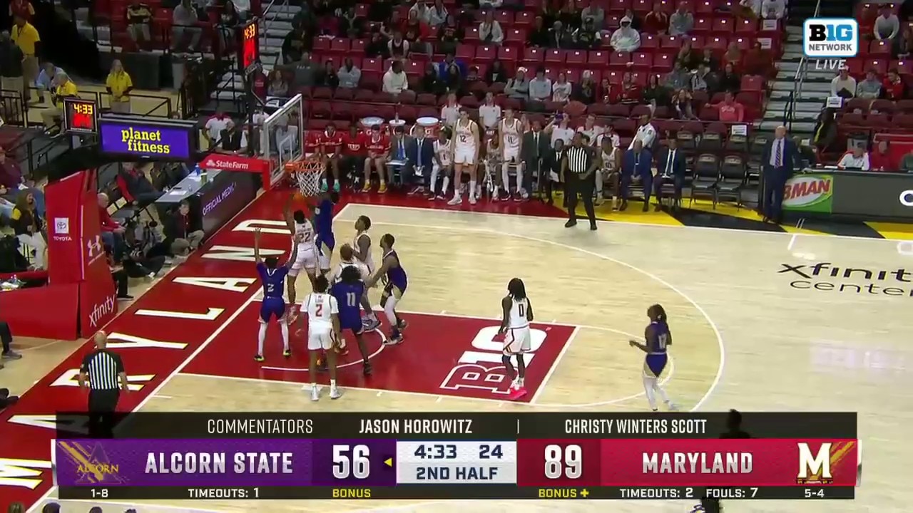 Maryland's Caelum Swanton-Rodge grabs the rebound and delivers a powerful two-handed jam