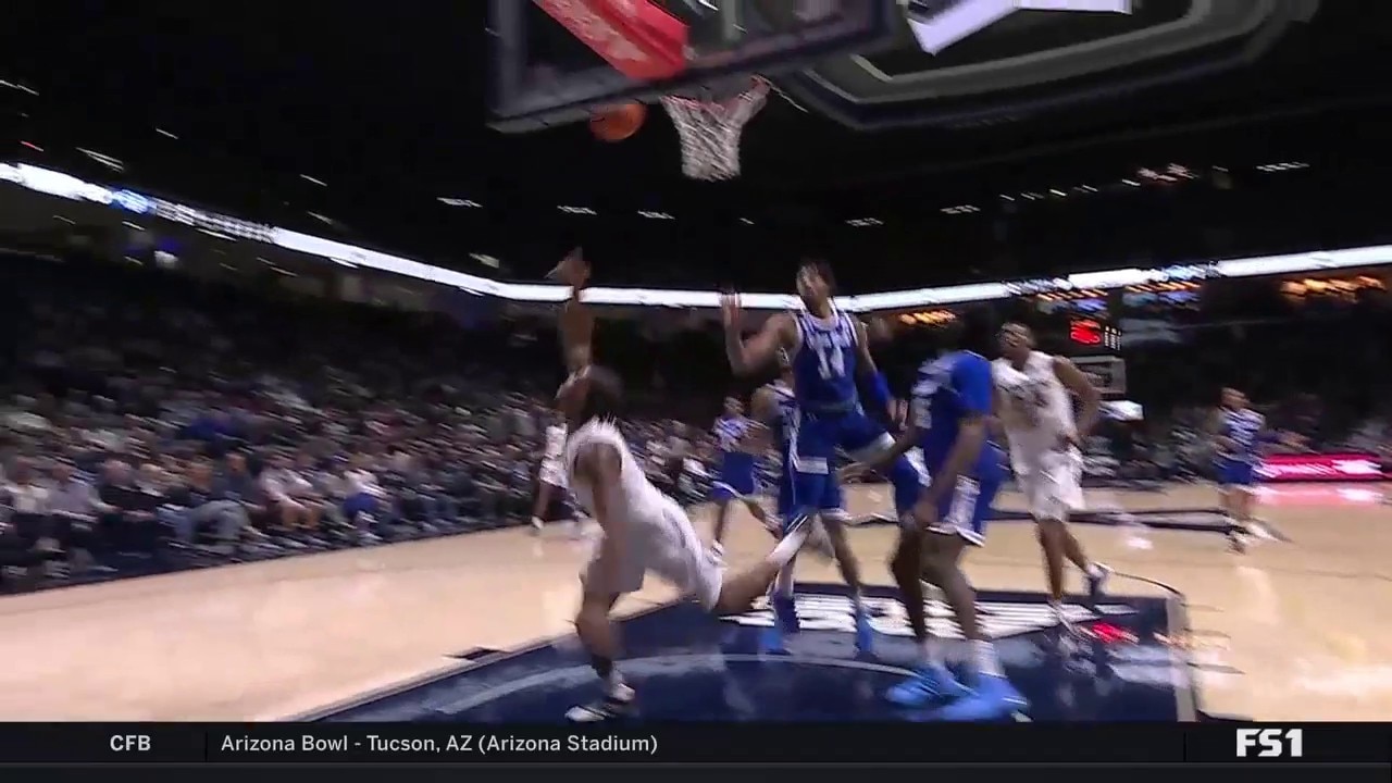 Xavier's Quincy Olivari Euro steps through the lane and finishes the and-1 layup to take the lead from Seton Hall
