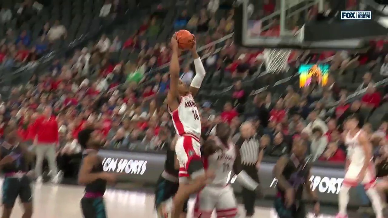 Arizona’s Keshad Johnson attacks the rim for a NASTY jam against Florida Atlantic