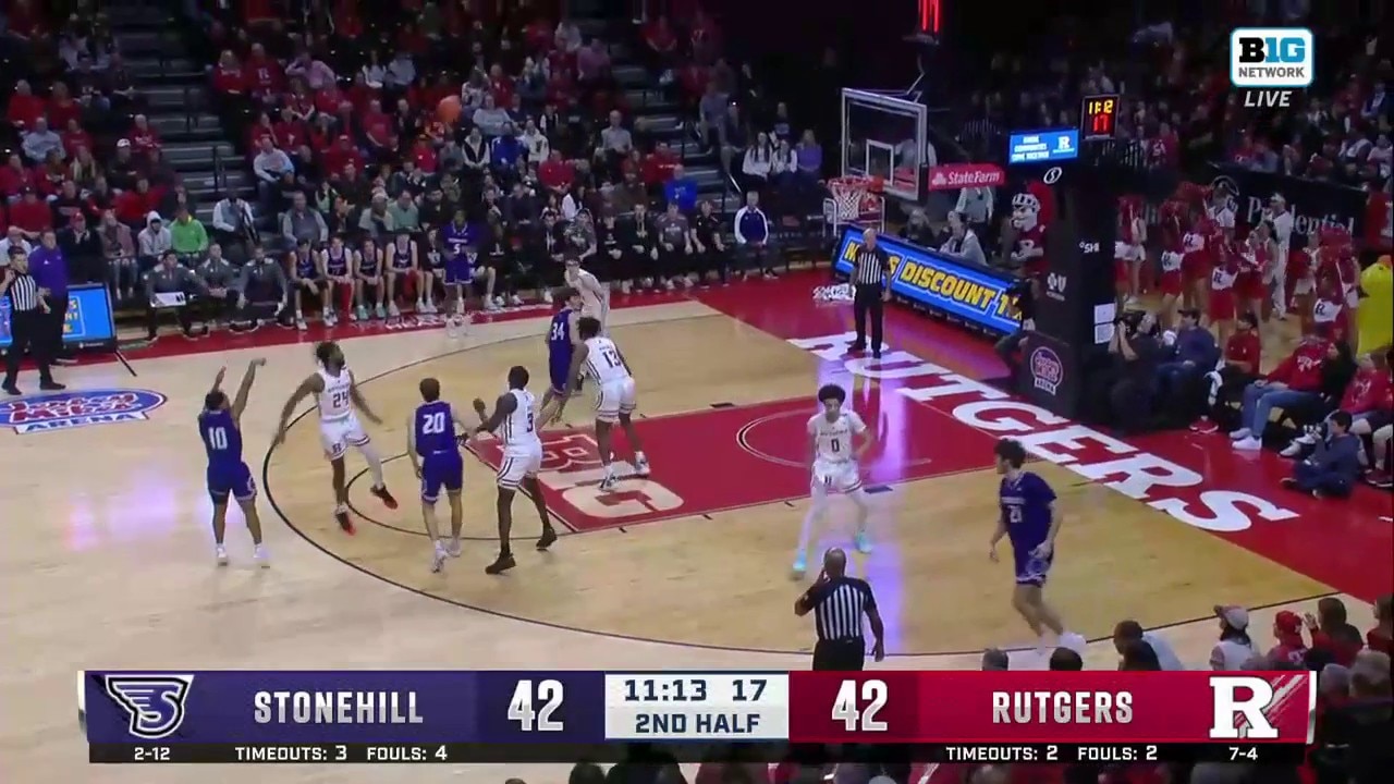 Tony Felder buries a deep three to complete Stonehill's 13-0 run to take the lead vs. Rutgers