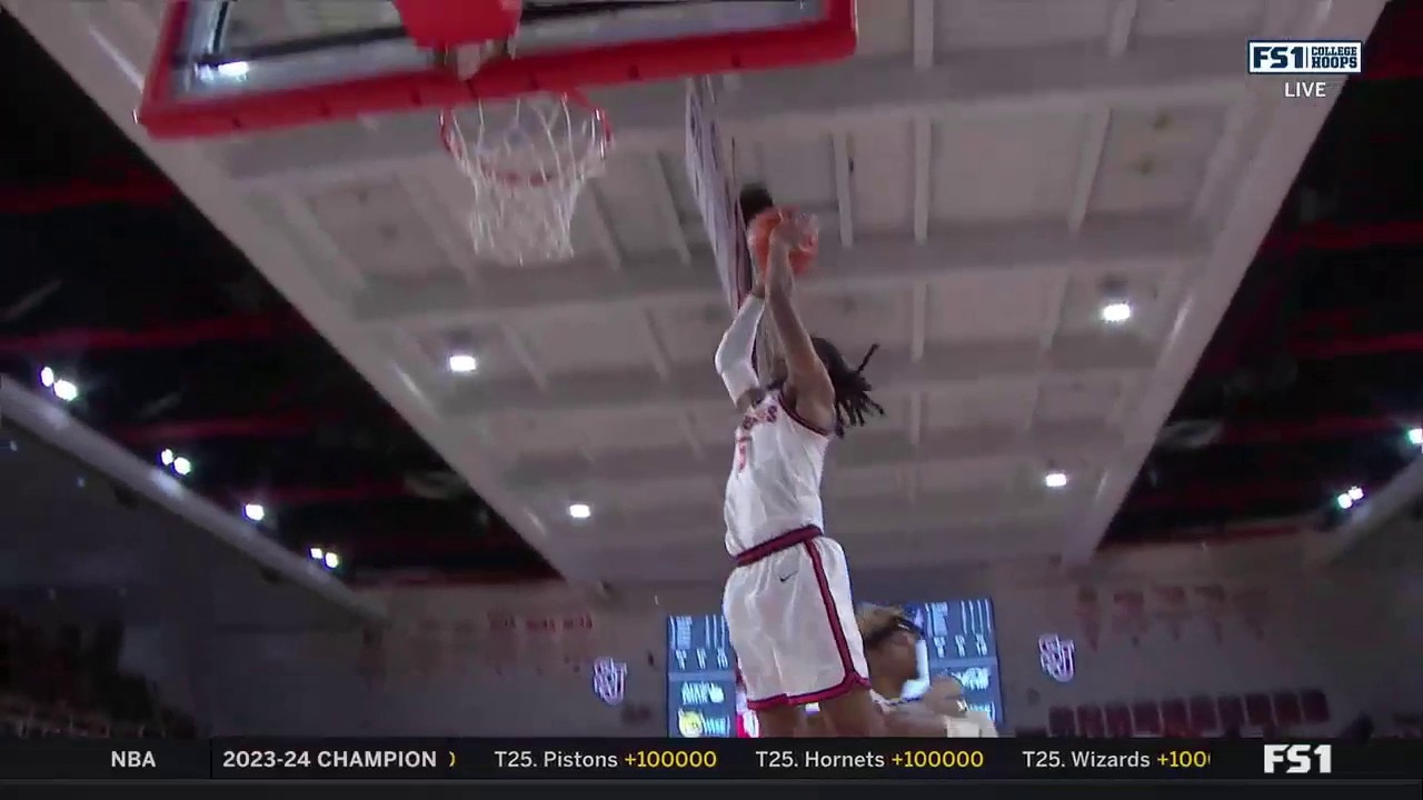 Daniss Jenkins throws down a two-handed dunk to help St. John's defeat Butler, 86-70