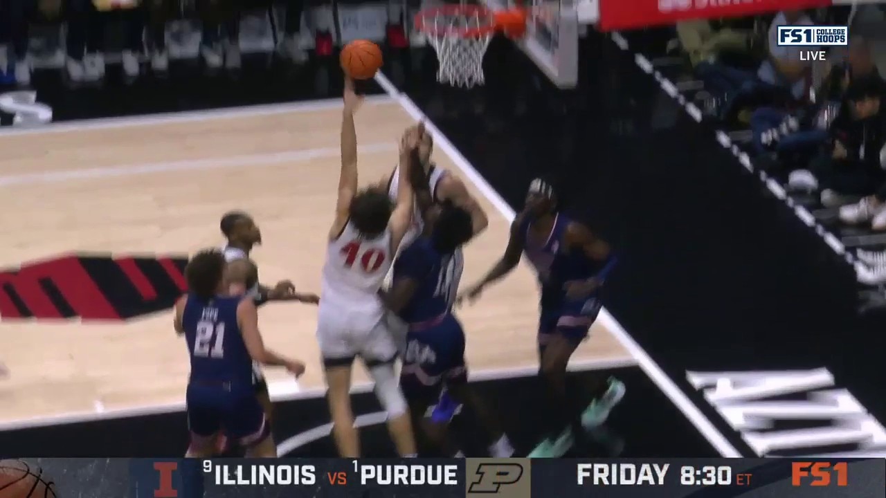 San Diego State's Miles Heide crashes the boards and finishes a tough And-1 post hook vs. Fresno State