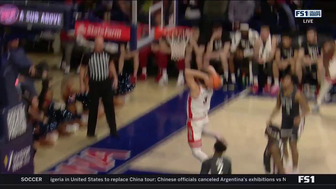 Arizona's Pelle Larsson skies for a hammer against Washington State