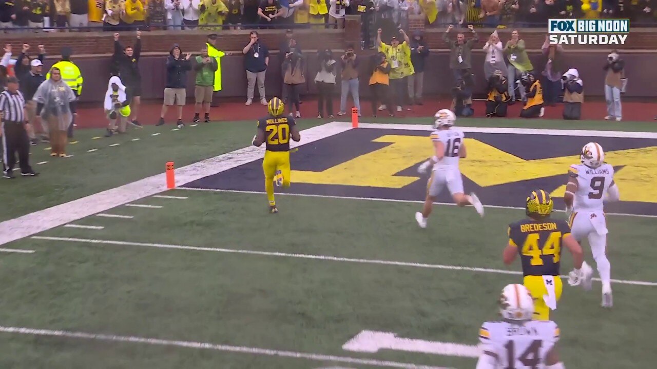 Michigan’s Kalel Mullings rushes for a 27-yard touchdown vs. Minnesota
