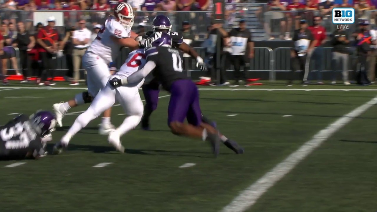 Justice Ellison bulldozes his way past Northwestern’s defense on a five-yard rushing TD as Indiana strikes first
