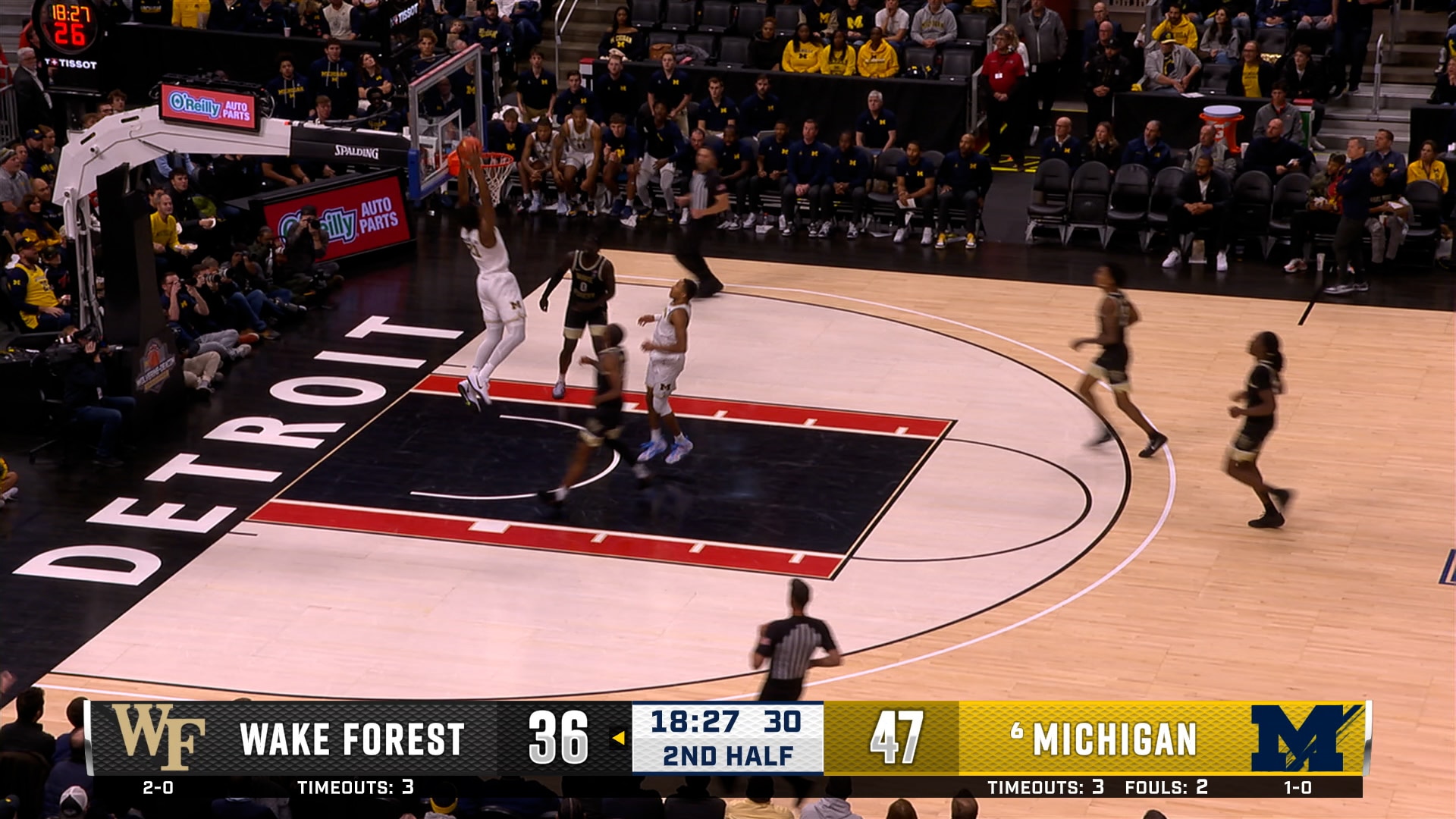 Morez Johnson Jr. finishes the alley-oop dunk in transition, extending Michigan's lead over Wake Forest