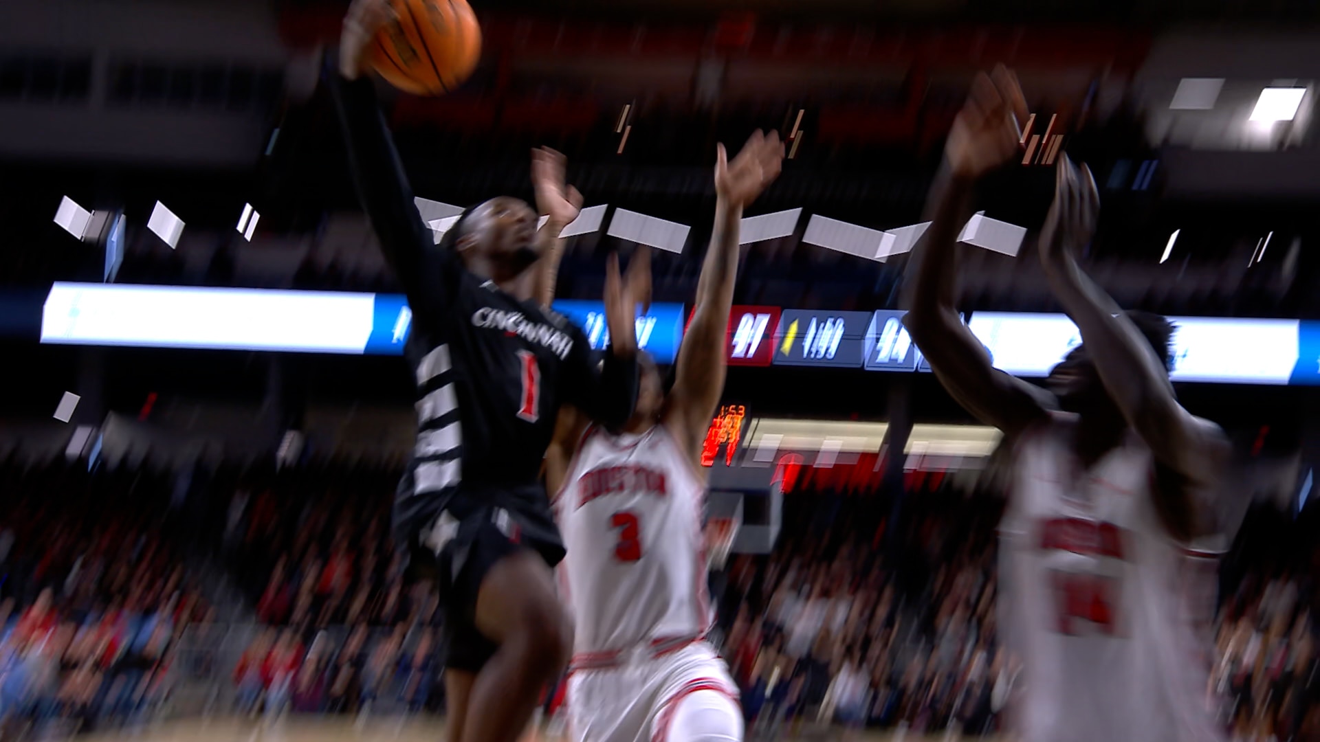Day Day Thomas powerful drive towards the basket extends Cincinnati’s lead over No. 8 Houston