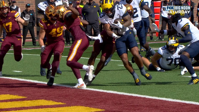 Jordan Marshall rushes for five-yard touchdown to bring Michigan level with Minnesota