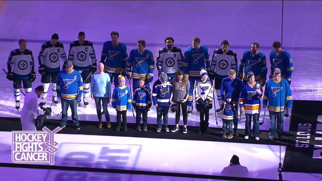 Blues honor those who have fought cancer before game against Jets