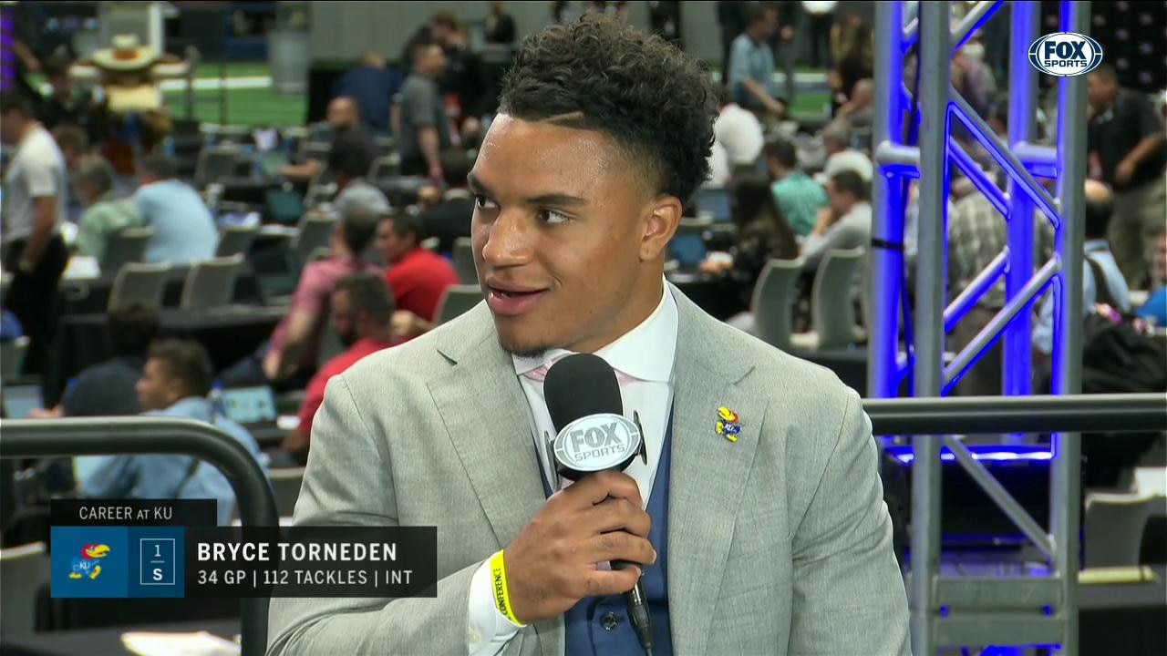 Bryce Torneden at the desk | Big 12 Media Days