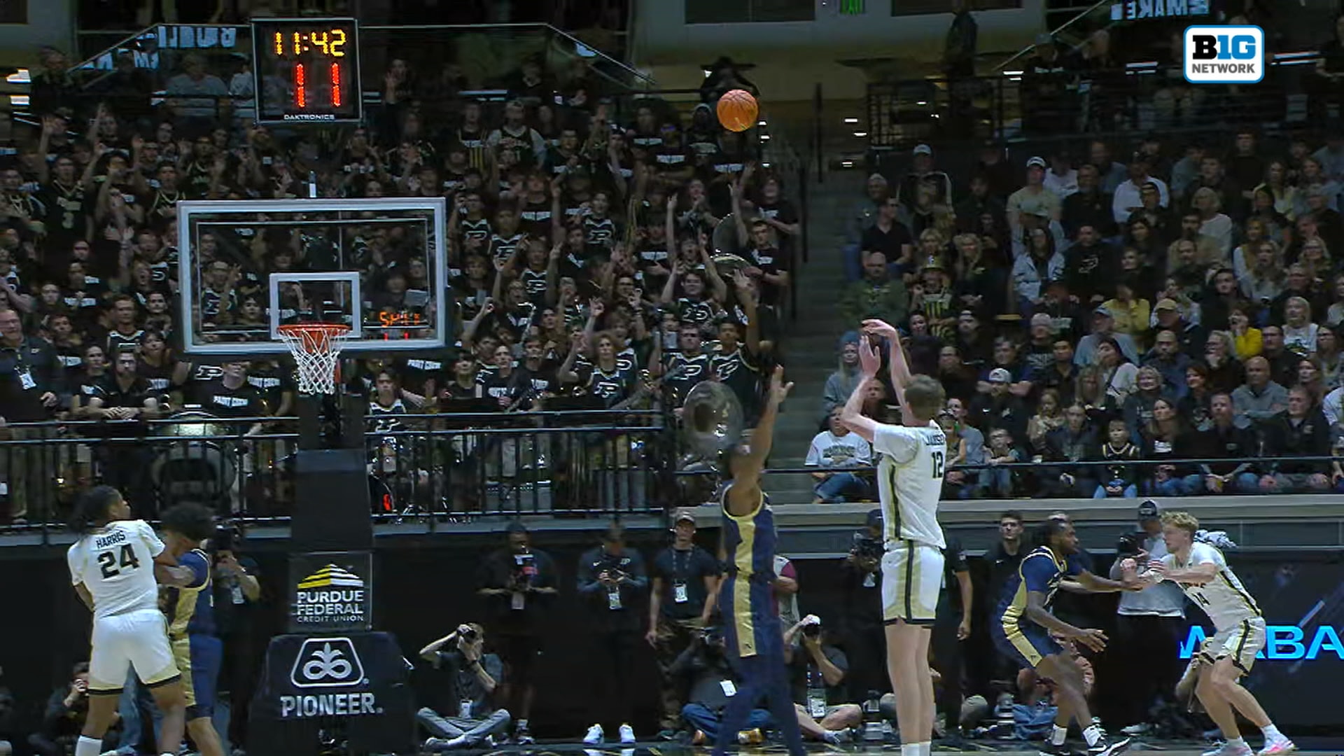 Purdue's 7' 4" center Daniel Jacobsen splashes 3-pointer to extend lead over Akron