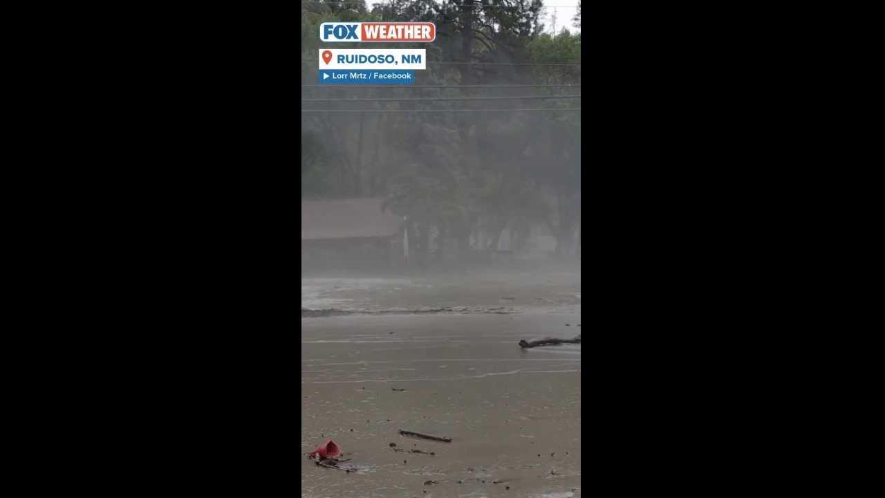 Heavy flooding covers a road in Ruidoso, New Mexico