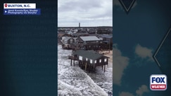 Watch: Workers try to save battered beachfront home along North Carolina's Outer Banks