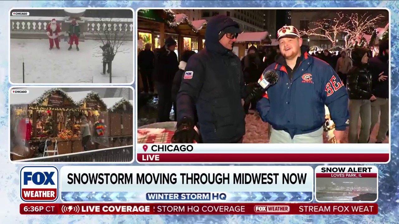 Windy City Whiteout: Spirits are high and temperatures are low around Chicago