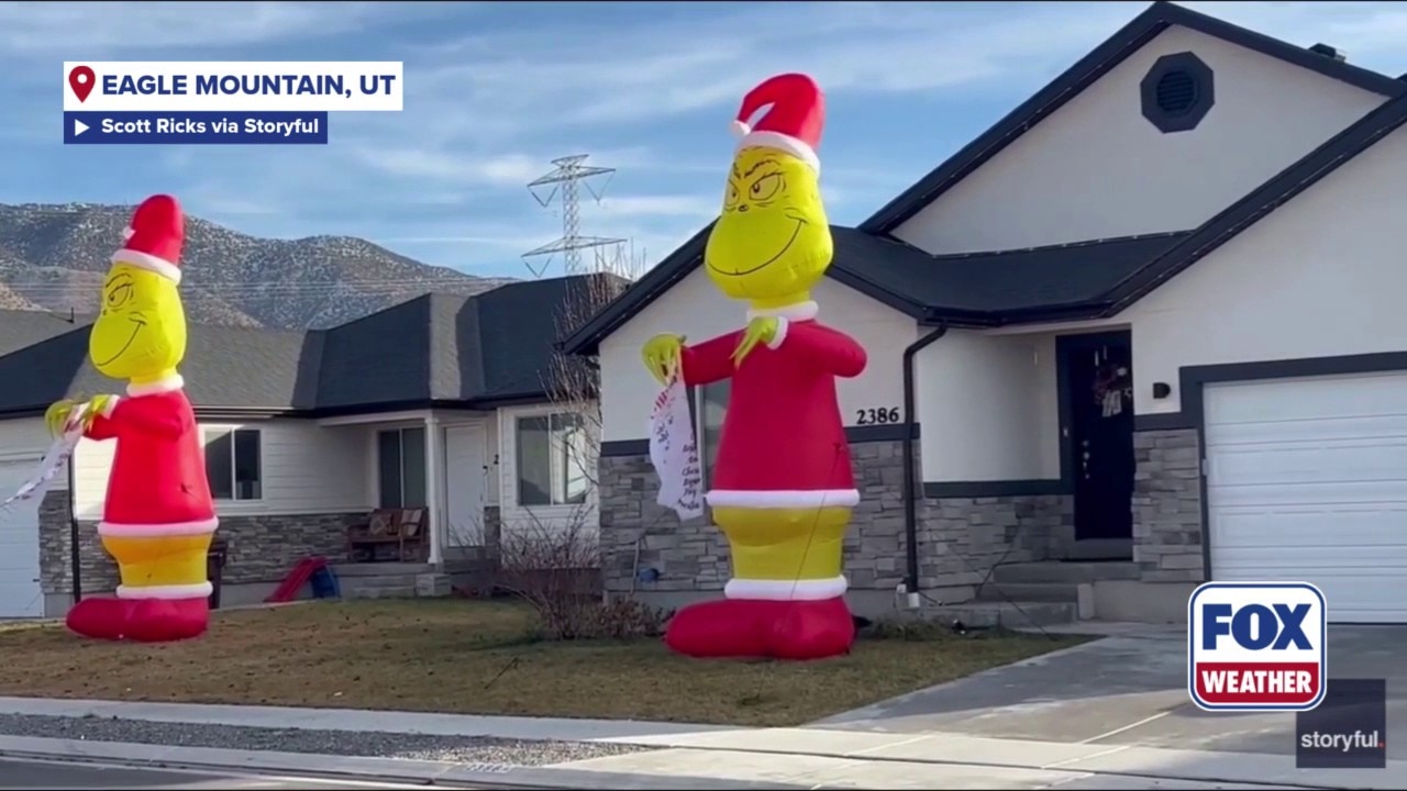 Watch: Giant Christmas inflatable lawn decorations take over Utah neighborhood