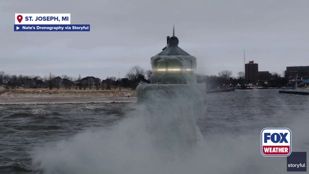 Watch: Waves crash onto ice-coated lighthouse on Lake Michigan