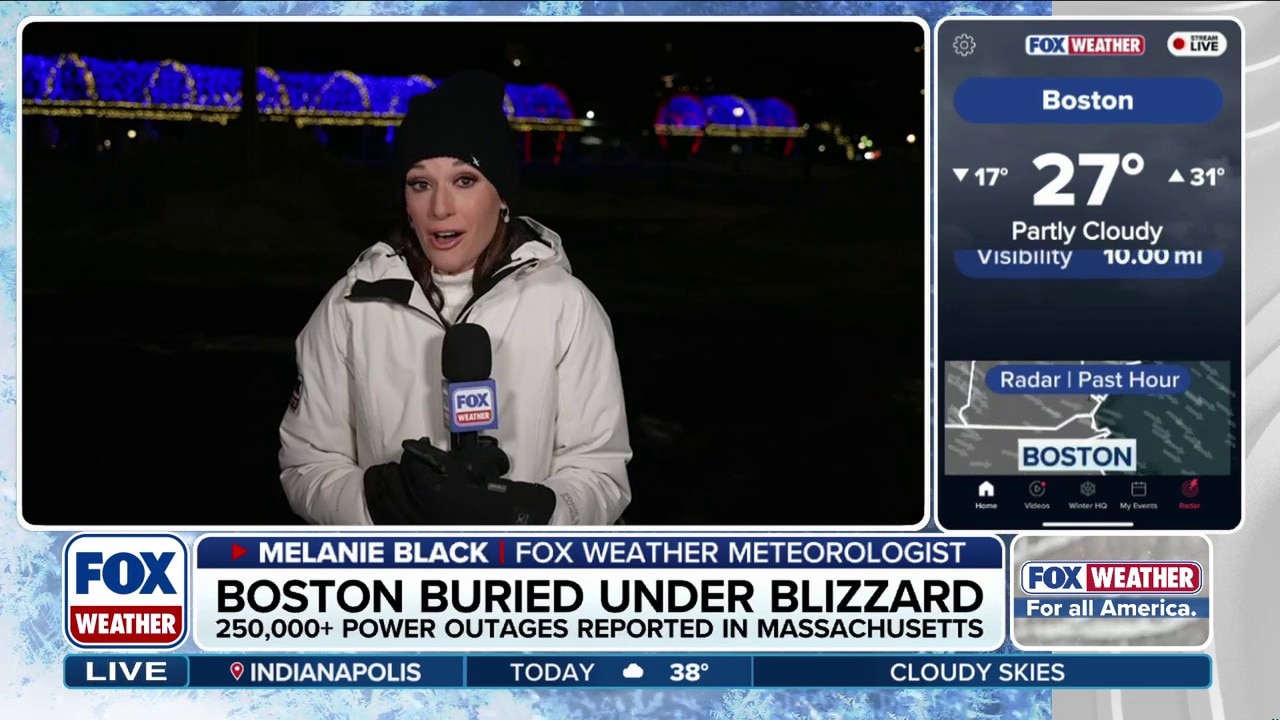 Boston digs out after historic blizzard dumps over a foot of snow, unleashes powerful wind gusts