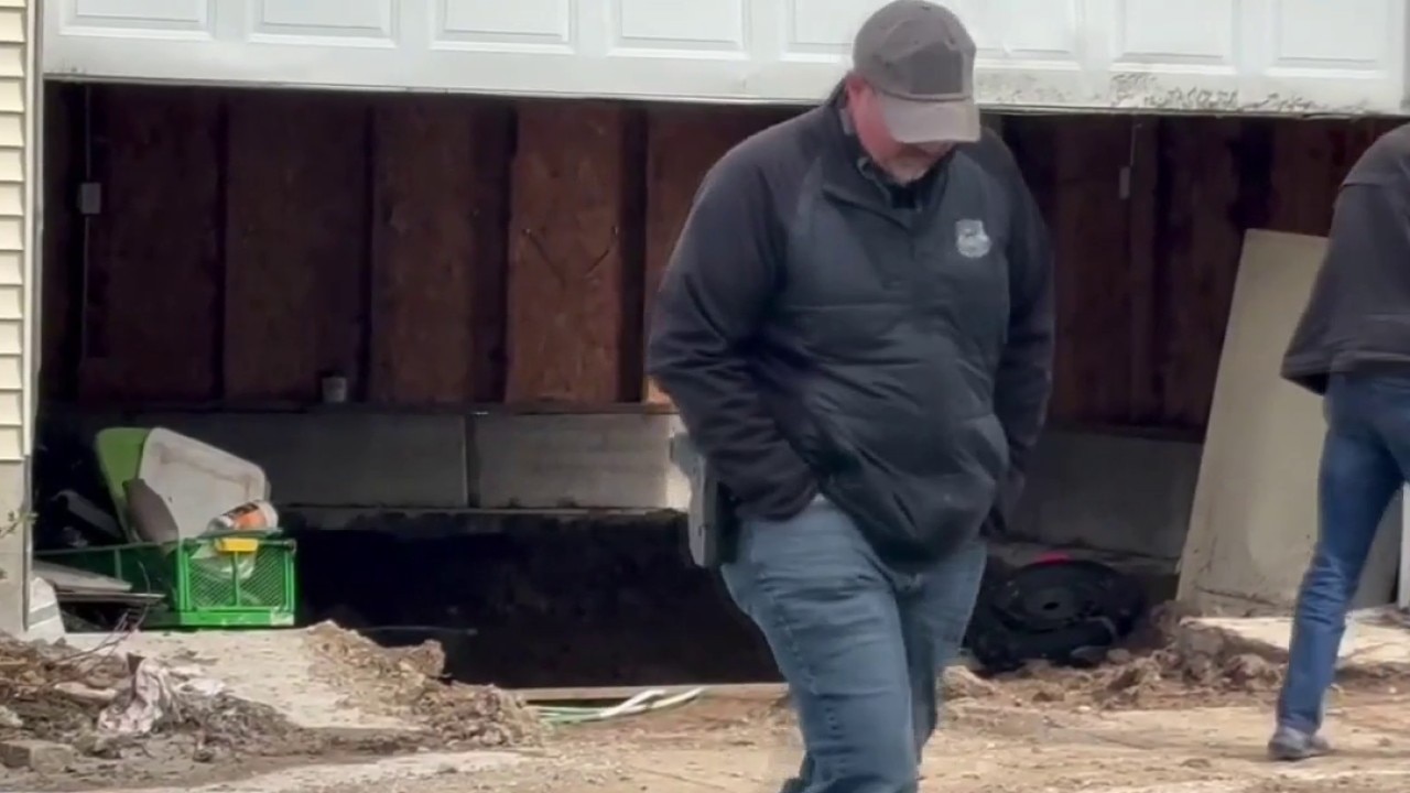 Milwaukee police scene near 15th and Hauser; garage searched