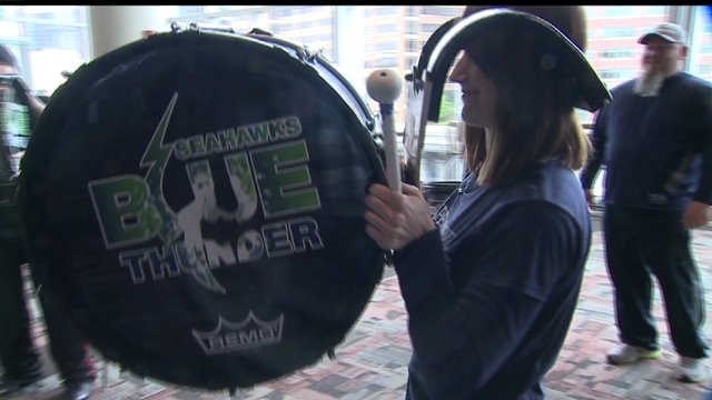 WATCH: Kaci tries out for Seahawks Blue Thunder Drumline!