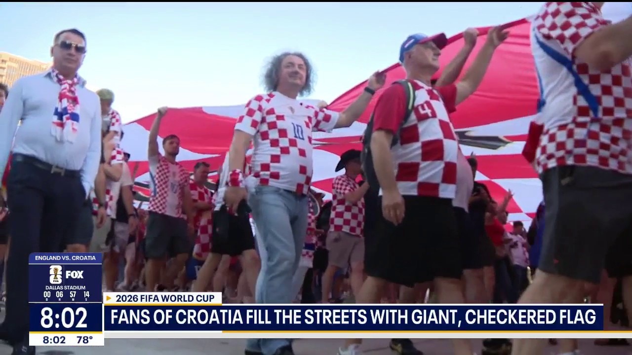 Croatia fans fill the streets with giant flags