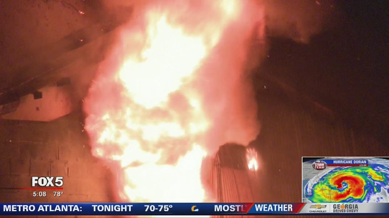 Large business fire sets off explosions