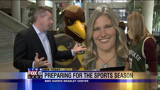 Laura talks with MU Deputy Athletic Director Brian Hardin