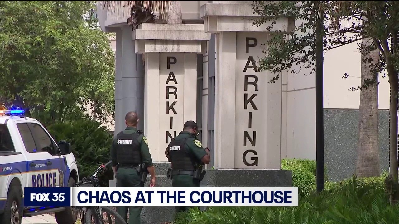 Suspect fired gun at woman in downtown Orlando parking garage
