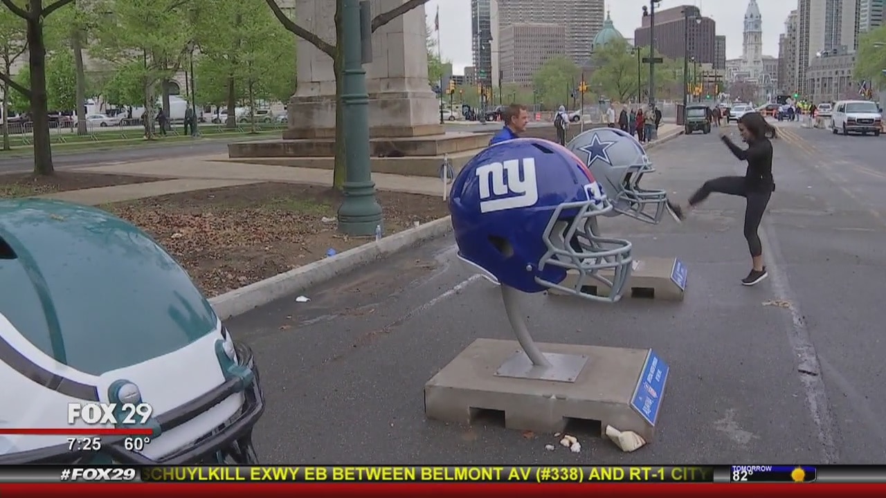 Helmets from all 32 NFL teams available for pictures, even the Cowboys