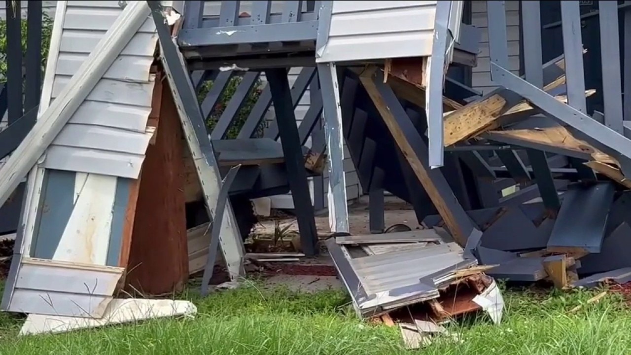 Truck crashes into apartment building 