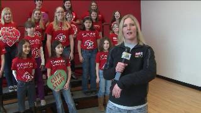 Laura learns about fundraiser for Milwaukee Children's Choir