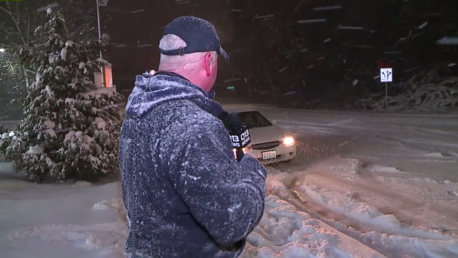 Snow causing traffic backups, spinouts