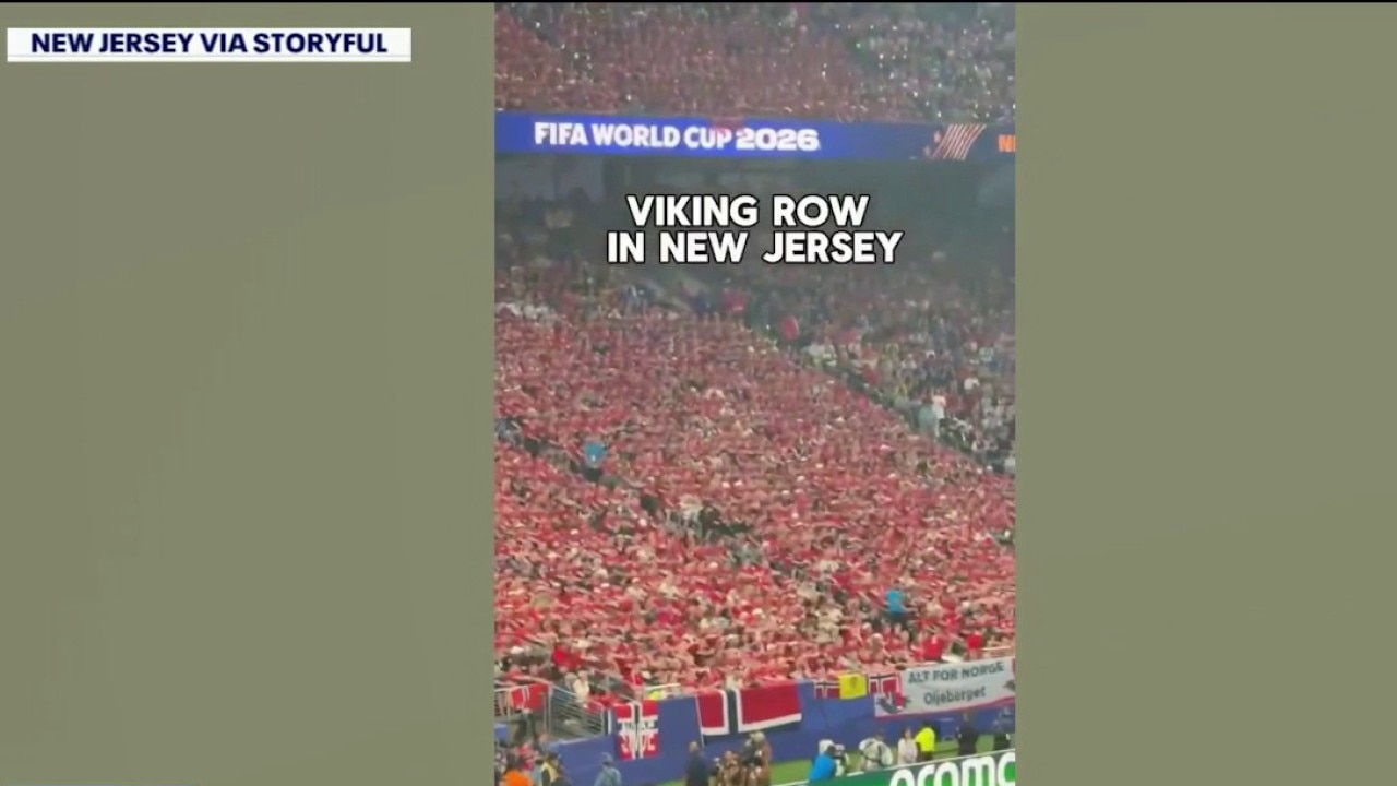 Norway fans and senior citizens perform Viking row