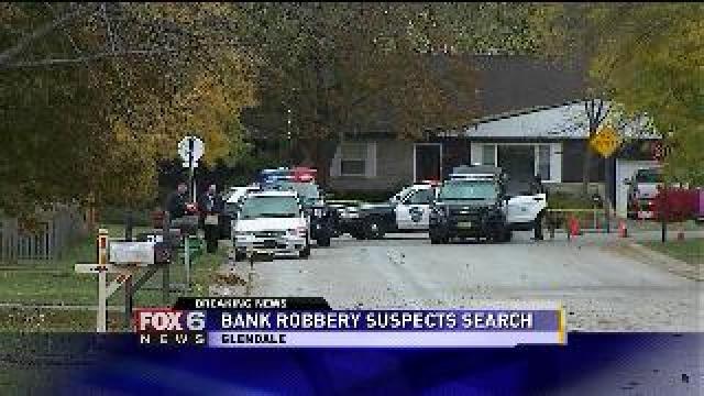 Police search for suspects after credit union robbery