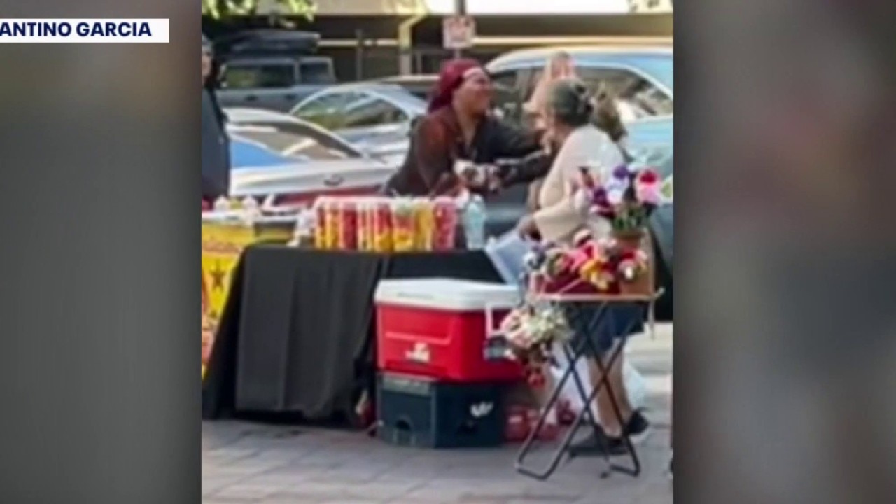 Woman charged with attacking LA street vendor