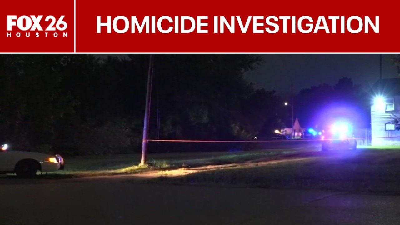2 questioned after body found in Houston trash can