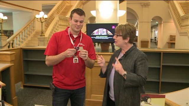 Chip learns how to be a librarian at the Milwaukee Public Library