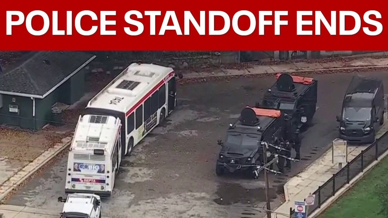Barricaded suspect hospitalized hours after deadly double shooting, fire in East Mount Airy